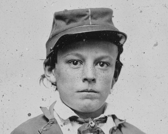 Unidentified young soldier in Confederate infantry uniform -  possibly drummer boy