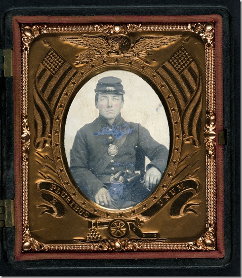 Roswell K. Bishop of Company I, 123rd New York Infantry Regiment in uniform with holstered revolver