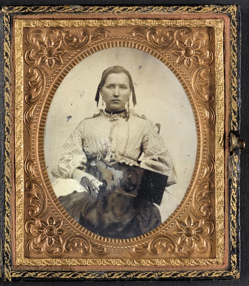 Unidentified woman with cased photograph of Private W.R. Clack Co. B, 43rd Tennessee Infantry Regiment