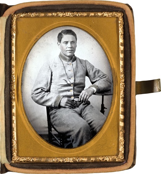 Unidentified soldier in Confederate uniform with lanyard around his neck in photo case