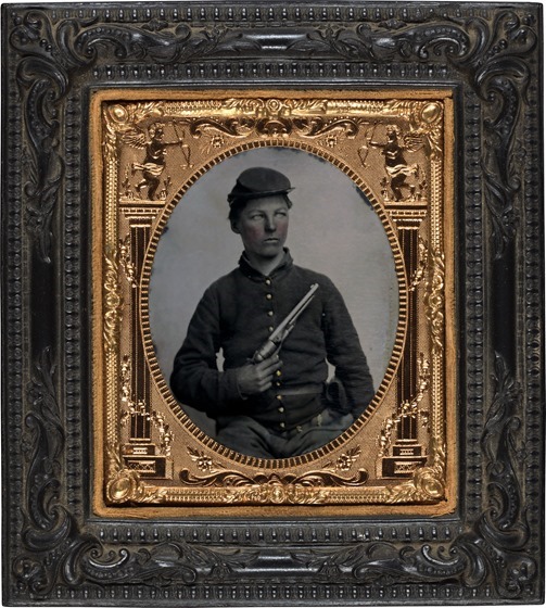 Unidentified soldier in Union uniform with Colt Army Model 1860 revolver in photo case