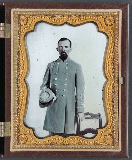 Unidentified officer in Confederate lieutenant's uniform with kepi - in frame