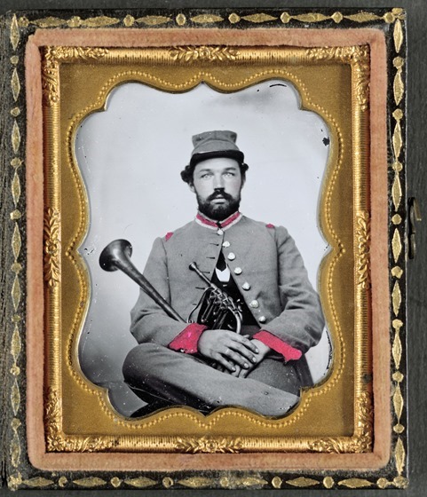 Unidentified soldier in Confederate uniform with saxhorn-- in frame