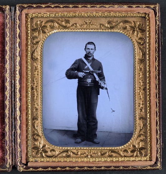 Unidentified soldier in Union cavalry uniform with Colt -- in frame 