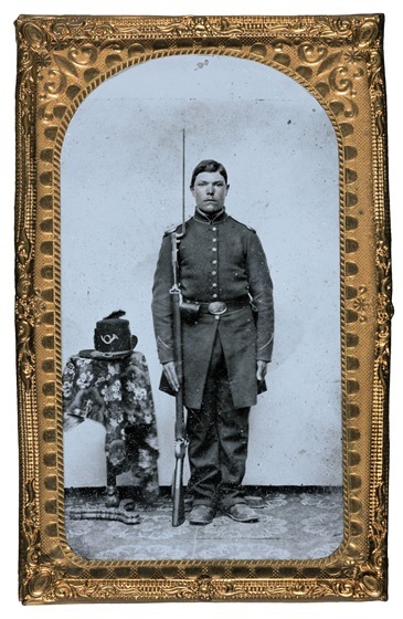 Unidentified soldier in Union frock coat with bayoneted musket-- in frame