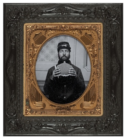 Unidentified soldier in Union uniform with canteen -- in frame